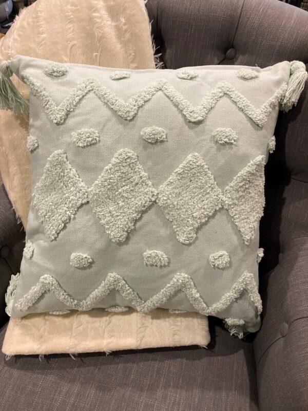 Mint green cushion with feather filled insert